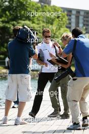 Jenson Button (GBR) McLaren signs autographs for the fans. 07.06.2012. Formula 1 World Championship, Rd 7, Canadian Grand Prix, Montreal, Canada, Preparation Day