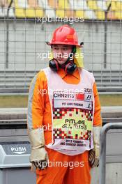 Pit lane fireman. 13.04.2012. Formula 1 World Championship, Rd 3, Chinese Grand Prix, Shanghai, China, Practice Day