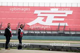 Sebastien Buemi (SUI) Red Bull Racing and Scuderia Toro Rosso Reserve Driver watches trackside. 13.04.2012. Formula 1 World Championship, Rd 3, Chinese Grand Prix, Shanghai, China, Practice Day