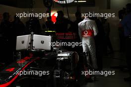 Lewis Hamilton (GBR) McLaren MP4/27 in the pits with his father Anthony Hamilton (GBR). 13.04.2012. Formula 1 World Championship, Rd 3, Chinese Grand Prix, Shanghai, China, Practice Day