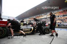 Romain Grosjean (FRA) Lotus F1 E20 in the pits. 13.04.2012. Formula 1 World Championship, Rd 3, Chinese Grand Prix, Shanghai, China, Practice Day