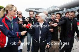 Bernie Ecclestone (GBR) CEO Formula One Group (FOM) with Rachel Brookes (GBR) Sky Sports News Presenter (Left) and othe members of the media. 13.04.2012. Formula 1 World Championship, Rd 3, Chinese Grand Prix, Shanghai, China, Practice Day