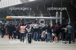 Photographers in the pit lane. 13.04.2012. Formula 1 World Championship, Rd 3, Chinese Grand Prix, Shanghai, China, Practice Day