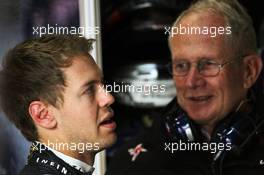 (L to R): Sebastian Vettel (GER) Red Bull Racing with Dr Helmut Marko (AUT) Red Bull Motorsport Consultant. 13.04.2012. Formula 1 World Championship, Rd 3, Chinese Grand Prix, Shanghai, China, Practice Day