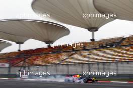 Mark Webber (AUS) Red Bull Racing RB8 locks up under braking. 13.04.2012. Formula 1 World Championship, Rd 3, Chinese Grand Prix, Shanghai, China, Practice Day
