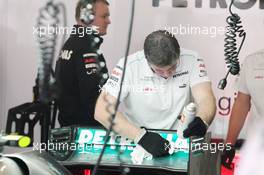 Mercedes AMG F1 W03 rear wing cleaned by a mechanic. 13.04.2012. Formula 1 World Championship, Rd 3, Chinese Grand Prix, Shanghai, China, Practice Day
