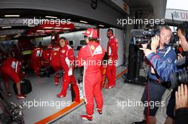 Fernando Alonso (ESP) Ferrari watches his team in the pits. 13.04.2012. Formula 1 World Championship, Rd 3, Chinese Grand Prix, Shanghai, China, Practice Day