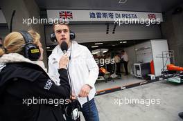 (L to R): Jenny Gow (GBR) BBC Radio 5 Live Pitlane Reporter with Paul di Resta (GBR) Sahara Force India F1. 13.04.2012. Formula 1 World Championship, Rd 3, Chinese Grand Prix, Shanghai, China, Practice Day