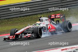 Lewis Hamilton (GBR) McLaren MP4/27 locks up under braking. 13.04.2012. Formula 1 World Championship, Rd 3, Chinese Grand Prix, Shanghai, China, Practice Day