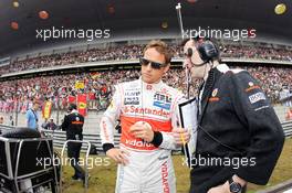 Jenson Button (GBR) McLaren on the grid. 15.04.2012. Formula 1 World Championship, Rd 3, Chinese Grand Prix, Shanghai, China, Race Day