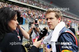 Sebastian Vettel (GER) Red Bull Racing on the grid. 15.04.2012. Formula 1 World Championship, Rd 3, Chinese Grand Prix, Shanghai, China, Race Day