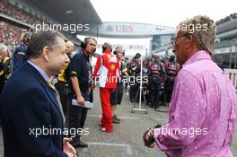 (L to R): Jean Todt (FRA) FIA President with Eddie Jordan (IRE) BBC Television Pundit on the grid. 15.04.2012. Formula 1 World Championship, Rd 3, Chinese Grand Prix, Shanghai, China, Race Day
