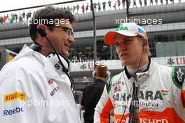 (L to R): Bradley Joyce (GBR) Sahara Force India F1 Race Engineer with Nico Hulkenberg (GER) Sahara Force India F1 on the grid. 15.04.2012. Formula 1 World Championship, Rd 3, Chinese Grand Prix, Shanghai, China, Race Day