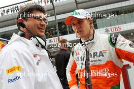 (L to R): Bradley Joyce (GBR) Sahara Force India F1 Race Engineer with Nico Hulkenberg (GER) Sahara Force India F1 on the grid. 15.04.2012. Formula 1 World Championship, Rd 3, Chinese Grand Prix, Shanghai, China, Race Day