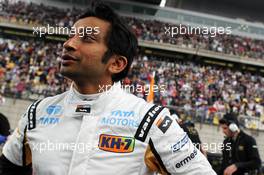 Narain Karthikeyan (IND) Hispania Racing F1 Team (HRT) on the grid. 15.04.2012. Formula 1 World Championship, Rd 3, Chinese Grand Prix, Shanghai, China, Race Day