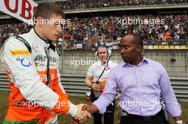 (L to R): Paul di Resta (GBR) Sahara Force India F1 with Anthony Hamilton (GBR) on the grid. 15.04.2012. Formula 1 World Championship, Rd 3, Chinese Grand Prix, Shanghai, China, Race Day