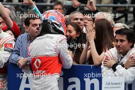 Jenson Button (GBR) McLaren celebrates his second position in parc ferme with girlfriend Jessica Michibata (JPN) and her sister Angelica Michibata (JPN). 15.04.2012. Formula 1 World Championship, Rd 3, Chinese Grand Prix, Shanghai, China, Race Day