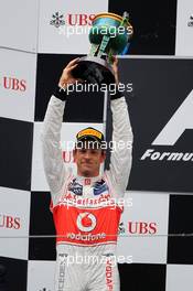 Jenson Button (GBR) McLaren celebrates his second position on the podium. 15.04.2012. Formula 1 World Championship, Rd 3, Chinese Grand Prix, Shanghai, China, Race Day
