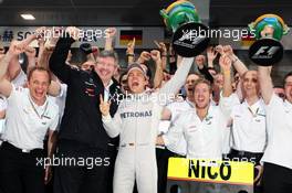Race winner Nico Rosberg (GER) Mercedes AMG F1 celebrates with Ross Brawn (GBR) Mercedes AMG F1 Team Principal; Sam Bird (GBR) Mercedes AMG F1 Test And Reserve Driver and the rest of the team. 15.04.2012. Formula 1 World Championship, Rd 3, Chinese Grand Prix, Shanghai, China, Race Day