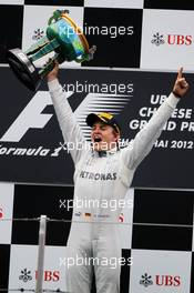 Race winner Nico Rosberg (GER) Mercedes AMG F1 celebrates on the podium. 15.04.2012. Formula 1 World Championship, Rd 3, Chinese Grand Prix, Shanghai, China, Race Day