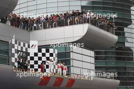 The podium (L to R): Jenson Button (GBR) McLaren, second; Nico Rosberg (GER) Mercedes AMG F1, race winner; Lewis Hamilton (GBR) McLaren, third; Norbert Haug (GER) Mercedes Sporting Director. 15.04.2012. Formula 1 World Championship, Rd 3, Chinese Grand Prix, Shanghai, China, Race Day