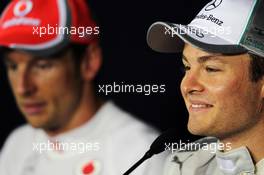 Race winner Nico Rosberg (GER) Mercedes AMG F1 and Jenson Button (GBR) McLaren in the FIA Press Conference. 15.04.2012. Formula 1 World Championship, Rd 3, Chinese Grand Prix, Shanghai, China, Race Day