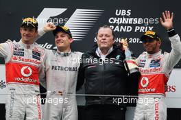 (L to R): Jenson Button (GBR) McLaren, second; Nico Rosberg (GER) Mercedes AMG F1, race winner; Norbert Haug (GER) Mercedes Sporting Director, Lewis Hamilton (GBR) McLaren, third. 15.04.2012. Formula 1 World Championship, Rd 3, Chinese Grand Prix, Shanghai, China, Race Day