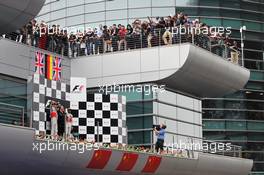 The podium (L to R): Jenson Button (GBR) McLaren, second; Nico Rosberg (GER) Mercedes AMG F1, race winner; Norbert Haug (GER) Mercedes Sporting Director; Lewis Hamilton (GBR) McLaren, third. 15.04.2012. Formula 1 World Championship, Rd 3, Chinese Grand Prix, Shanghai, China, Race Day