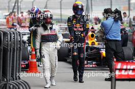 Kamui Kobayashi (JPN) Sauber (Left) and Mark Webber (AUS) Red Bull Racing in parc ferme. 15.04.2012. Formula 1 World Championship, Rd 3, Chinese Grand Prix, Shanghai, China, Race Day