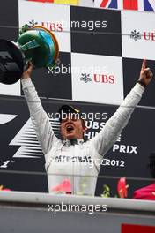 RACE WINNER Nico Rosberg (GER) Mercedes AMG F1 celebrates on the podium. 15.04.2012. Formula 1 World Championship, Rd 3, Chinese Grand Prix, Shanghai, China, Race Day