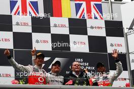 The podium (L to R): Jenson Button (GBR) McLaren, second; Nico Rosberg (GER) Mercedes AMG F1, race winner; Norbert Haug (GER) Mercedes Sporting Director; Lewis Hamilton (GBR) McLaren, third. 15.04.2012. Formula 1 World Championship, Rd 3, Chinese Grand Prix, Shanghai, China, Race Day