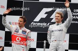 The podium (L to R): second placed Jenson Button (GBR) McLaren with race winner Nico Rosberg (GER) Mercedes AMG F1. 15.04.2012. Formula 1 World Championship, Rd 3, Chinese Grand Prix, Shanghai, China, Race Day