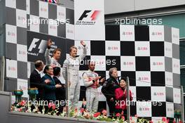 The podium (L to R): Jenson Button (GBR) McLaren, second; Nico Rosberg (GER) Mercedes AMG F1, race winner; Lewis Hamilton (GBR) McLaren, third; Norbert Haug (GER) Mercedes Sporting Director. 15.04.2012. Formula 1 World Championship, Rd 3, Chinese Grand Prix, Shanghai, China, Race Day