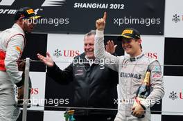 (L to R): Lewis Hamilton (GBR) McLaren with Norbert Haug (GER) Mercedes Sporting Director and race winner Nico Rosberg (GER) Mercedes AMG F1 on the podium. 15.04.2012. Formula 1 World Championship, Rd 3, Chinese Grand Prix, Shanghai, China, Race Day