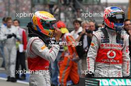 Lewis Hamilton (GBR) McLaren in parc ferme with Jenson Button (GBR) McLaren. 15.04.2012. Formula 1 World Championship, Rd 3, Chinese Grand Prix, Shanghai, China, Race Day