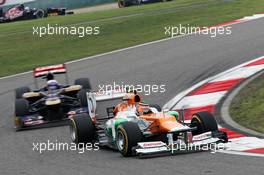 Nico Hulkenberg (GER) Sahara Force India F1 VJM05 leads Daniel Ricciardo (AUS) Scuderia Toro Rosso STR7. 15.04.2012. Formula 1 World Championship, Rd 3, Chinese Grand Prix, Shanghai, China, Race Day