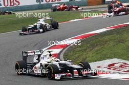 Sergio Perez (MEX) Sauber C31 leads team mate Kamui Kobayashi (JPN) Sauber C31. 15.04.2012. Formula 1 World Championship, Rd 3, Chinese Grand Prix, Shanghai, China, Race Day