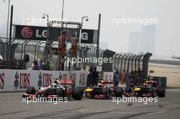 Lewis Hamilton (GBR) McLaren MP4/27 leads Sebastian Vettel (GER) Red Bull Racing RB8 and Mark Webber (AUS) Red Bull Racing RB8. 15.04.2012. Formula 1 World Championship, Rd 3, Chinese Grand Prix, Shanghai, China, Race Day