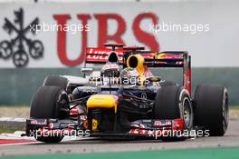 Sebastian Vettel (GER) Red Bull Racing RB8 leads Jenson Button (GBR) McLaren MP4/27. 15.04.2012. Formula 1 World Championship, Rd 3, Chinese Grand Prix, Shanghai, China, Race Day