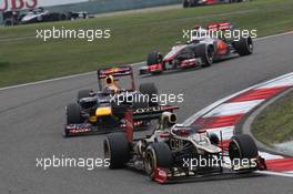 Kimi Raikkonen, Lotus Renault F1 Team leads Sebastian Vettel (GER), Red Bull Racing  15.04.2012. Formula 1 World Championship, Rd 3, Chinese Grand Prix, Shanghai, China, Race Day