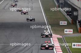 Lewis Hamilton (GBR) McLaren MP4/27 leads Sergio Perez (MEX) Sauber C31. 15.04.2012. Formula 1 World Championship, Rd 3, Chinese Grand Prix, Shanghai, China, Race Day