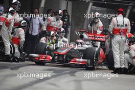 Jenson Button (GBR), McLaren Mercedes pit stop  15.04.2012. Formula 1 World Championship, Rd 3, Chinese Grand Prix, Shanghai, China, Race Day