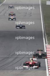 Felipe Massa (BRA) Ferrari F2012 leads Romain Grosjean (FRA) Lotus F1 E20. 15.04.2012. Formula 1 World Championship, Rd 3, Chinese Grand Prix, Shanghai, China, Race Day