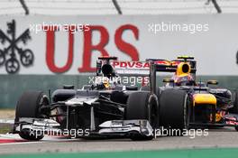 Pastor Maldonado (VEN) Williams FW34 leads Mark Webber (AUS) Red Bull Racing RB8. 15.04.2012. Formula 1 World Championship, Rd 3, Chinese Grand Prix, Shanghai, China, Race Day