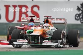 Paul di Resta (GBR) Sahara Force India VJM05 leads Fernando Alonso (ESP) Ferrari F2012. 15.04.2012. Formula 1 World Championship, Rd 3, Chinese Grand Prix, Shanghai, China, Race Day