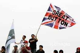 Jenson Button (GBR) McLaren fans and flag. 15.04.2012. Formula 1 World Championship, Rd 3, Chinese Grand Prix, Shanghai, China, Race Day