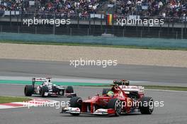Felipe Massa (BRA) Ferrari F2012 leads Kimi Raikkonen (FIN) Lotus E20 and Kamui Kobayashi (JPN) Sauber C31. 15.04.2012. Formula 1 World Championship, Rd 3, Chinese Grand Prix, Shanghai, China, Race Day