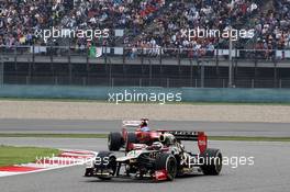 Kimi Raikkonen (FIN) Lotus E20 leads Fernando Alonso (ESP) Ferrari F2012. 15.04.2012. Formula 1 World Championship, Rd 3, Chinese Grand Prix, Shanghai, China, Race Day