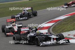 Bruno Senna (BRA), Williams F1 Team leads Lewis Hamilton (GBR), McLaren Mercedes  15.04.2012. Formula 1 World Championship, Rd 3, Chinese Grand Prix, Shanghai, China, Race Day