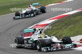 Race winner Nico Rosberg (GER) Mercedes AMG F1 W03 leads Michael Schumacher (GER) Mercedes AMG F1 W03. 15.04.2012. Formula 1 World Championship, Rd 3, Chinese Grand Prix, Shanghai, China, Race Day